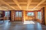 Step into a world of rustic elegance with this stunning property, showcasing exquisite wooden architecture.