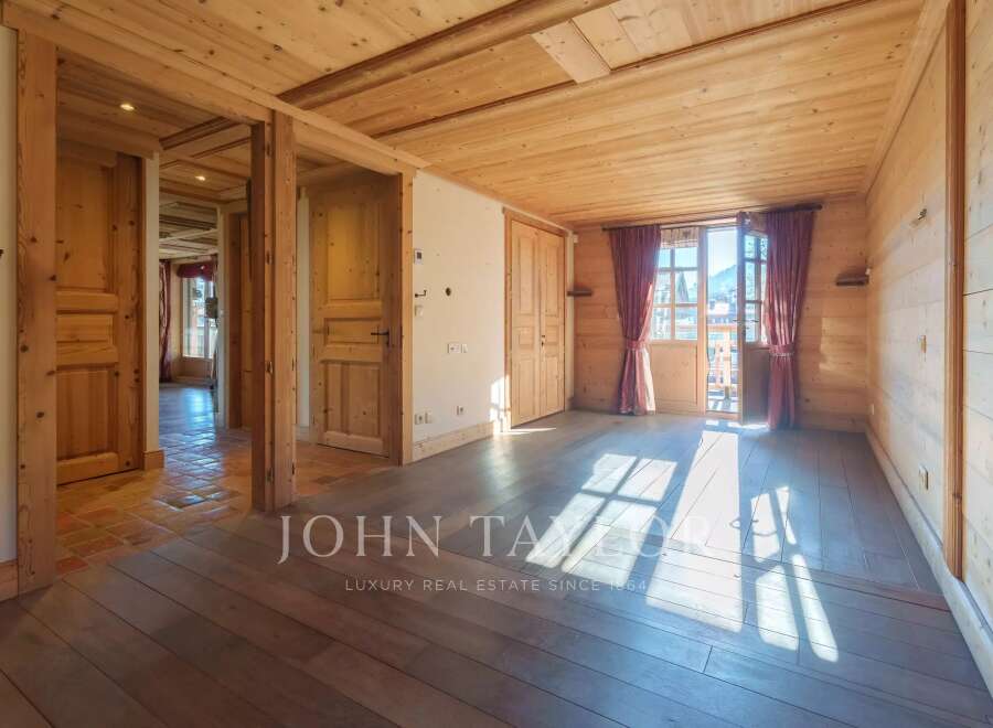 Step into a world of rustic charm with this stunning property, featuring exquisite wooden interiors and a warm, inviting ambiance.
