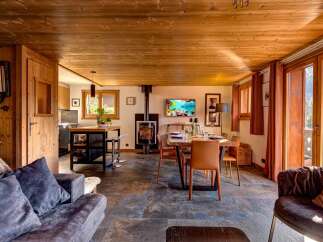 Experience the warmth of this charming chalet, perfect for a cozy retreat.