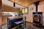 This stunning kitchen boasts a warm and inviting atmosphere, perfect for culinary creations and entertaining.