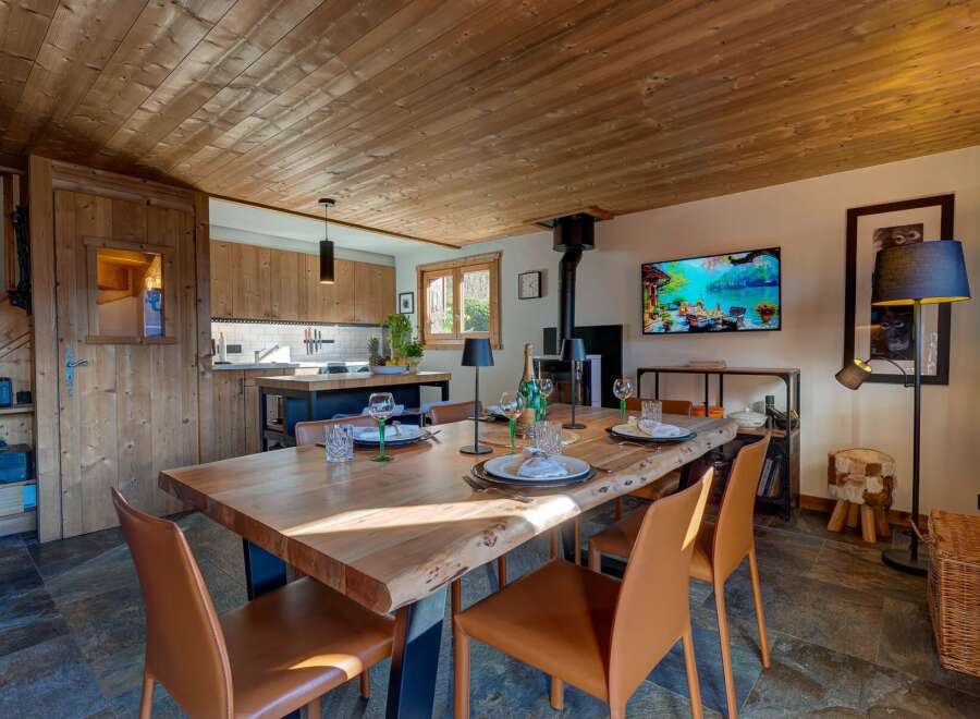 Experience luxury living in this stunning property, featuring a beautifully designed dining area perfect for entertaining.