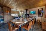Experience luxury living in this stunning property, featuring a beautifully designed dining area perfect for entertaining.