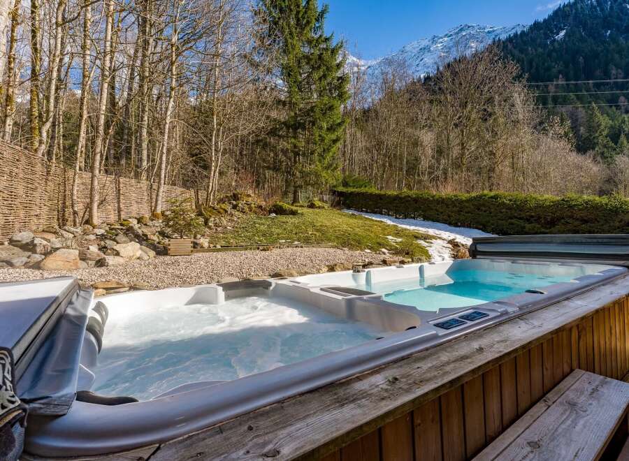 Enjoy the ultimate relaxation in this stunning property featuring a luxurious hot tub.
