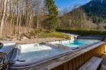 Enjoy the ultimate relaxation in this stunning property featuring a luxurious hot tub.