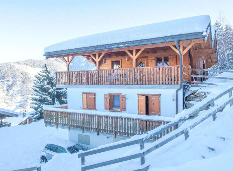 Discover the charm of this stunning chalet nestled in a winter wonderland.
