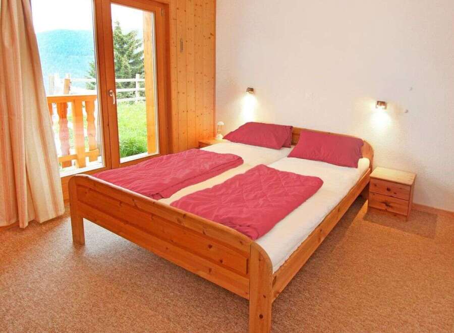 Discover the charm of this inviting bedroom, perfect for a relaxing getaway.