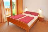 Discover the charm of this inviting bedroom, perfect for a relaxing getaway.
