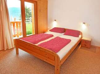 Discover the charm of this inviting bedroom, perfect for a relaxing getaway.