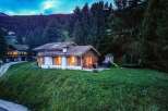 Nestled in a serene, wooded landscape, this charming property offers a perfect blend of comfort and natural beauty.