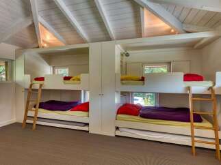 This stunning property features a unique bunk bed setup, perfect for a family or group.