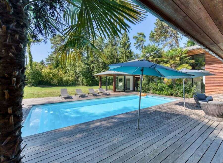 Escape to your own private oasis with this stunning property! Featuring a sparkling swimming pool, a spacious wooden deck, and a charming gazebo, this home is perfect for relaxation and entertaining.