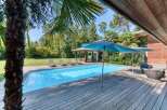 Escape to your own private oasis with this stunning property! Featuring a sparkling swimming pool, a spacious wooden deck, and a charming gazebo, this home is perfect for relaxation and entertaining.
