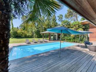 Escape to your own private oasis with this stunning property! Featuring a sparkling swimming pool, a spacious wooden deck, and a charming gazebo, this home is perfect for relaxation and entertaining.