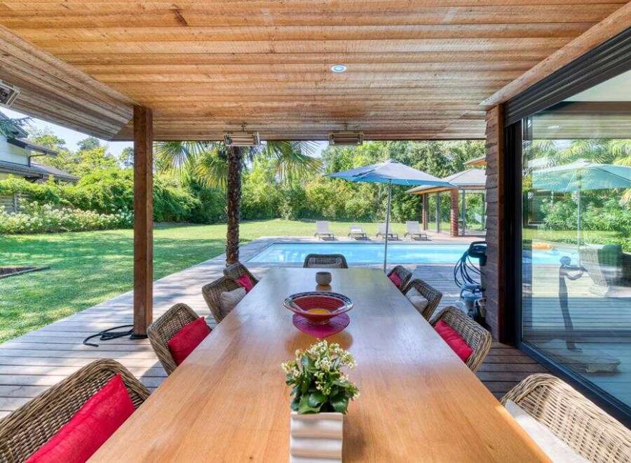 Experience luxury living with this stunning outdoor dining area.
