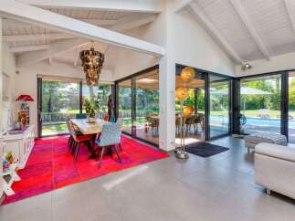 This stunning property boasts a bright and airy interior with a modern design.