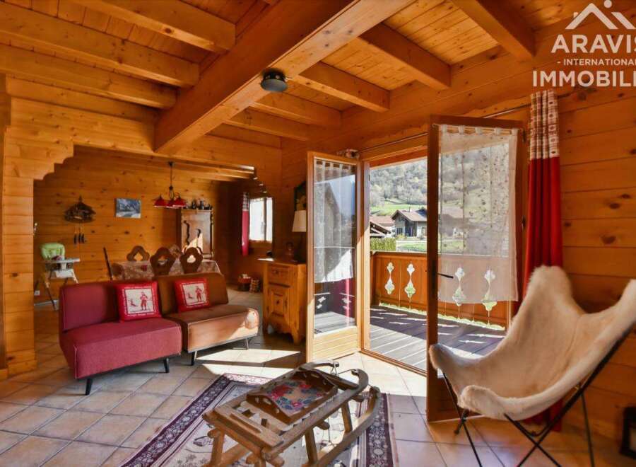 Discover the charm of this stunning property, featuring a cozy interior with wooden accents and a warm, inviting atmosphere.