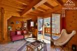 Discover the charm of this stunning property, featuring a cozy interior with wooden accents and a warm, inviting atmosphere.