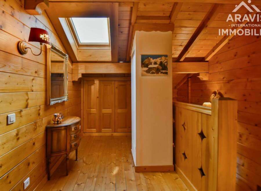 Discover the charm of this stunning property, featuring exquisite wooden paneling and a warm, inviting ambiance.