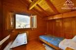 Discover the charm of this cozy wooden cabin, perfect for a peaceful retreat.