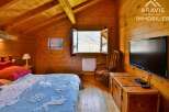 Discover the charm of this cozy wooden cabin, perfect for a mountain getaway.