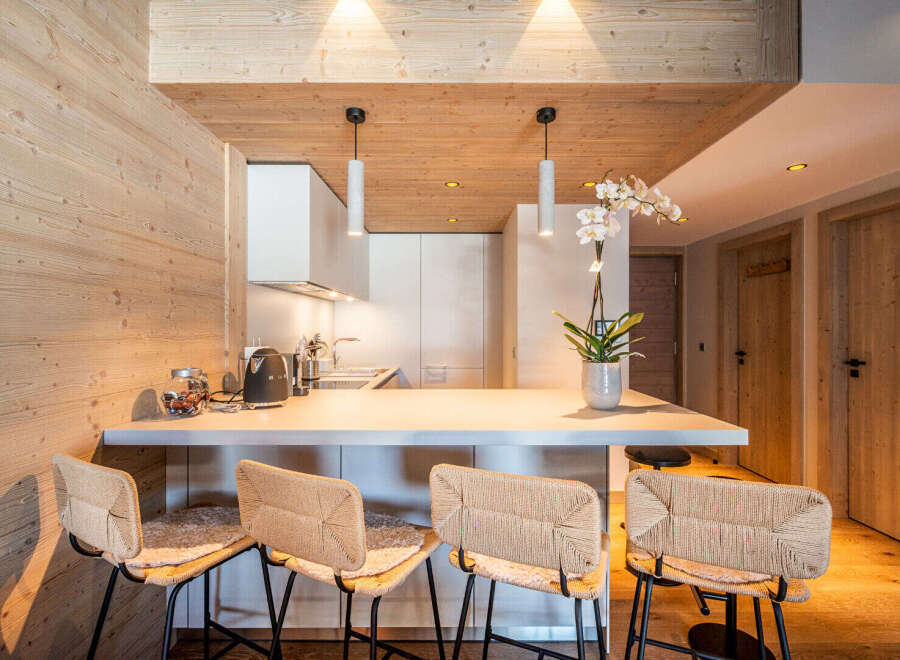 This stunning kitchen features a modern design with a warm, inviting atmosphere.