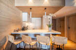 This stunning kitchen features a modern design with a warm, inviting atmosphere.