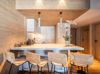This stunning kitchen features a modern design with a warm, inviting atmosphere.