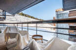 Enjoy breathtaking mountain views from this luxurious balcony.
