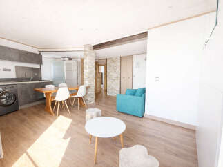 Discover modern living in this stylish property, featuring a bright and airy open-plan layout.
