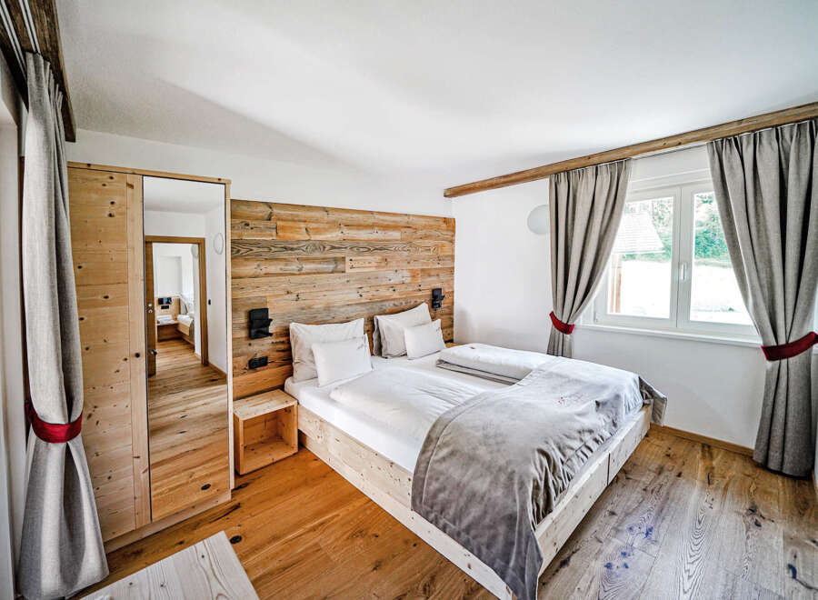 Experience rustic elegance in this stunning bedroom.