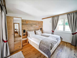 Experience rustic elegance in this stunning bedroom.