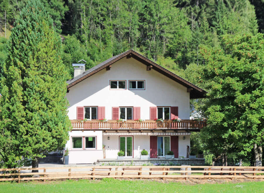 This stunning property boasts a charming facade with a traditional design, perfect for those seeking a serene retreat.