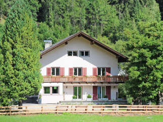 This stunning property boasts a charming facade with a traditional design, perfect for those seeking a serene retreat.