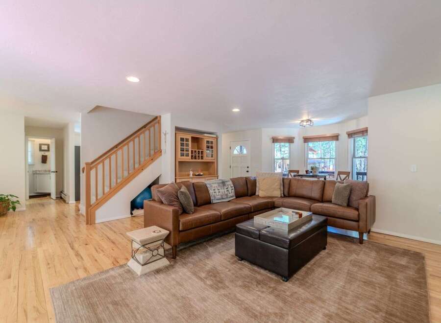 This stunning property boasts a spacious living area, perfect for entertaining or relaxing.