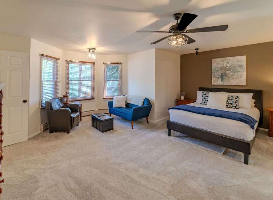 Step into luxury with this stunning bedroom, boasting a spacious layout and elegant design.
