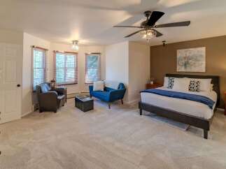 Step into luxury with this stunning bedroom, boasting a spacious layout and elegant design.