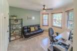 This versatile home office space offers a comfortable and functional environment.