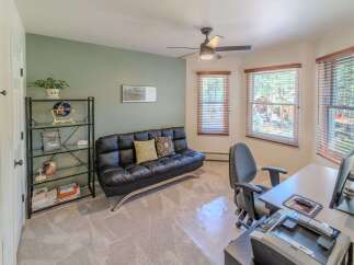 This versatile home office space offers a comfortable and functional environment.