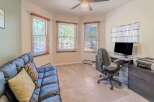This inviting home office offers a bright and airy workspace, perfect for productivity.