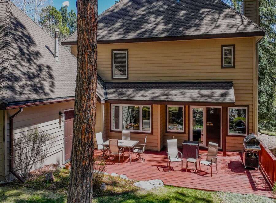 This stunning property boasts a spacious deck, perfect for outdoor entertaining and relaxation.