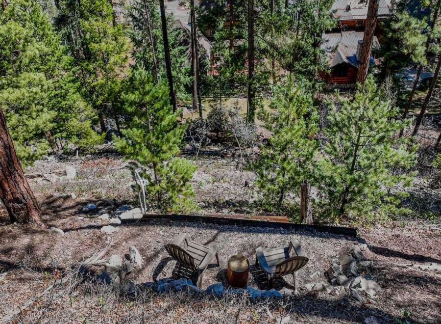 Escape to your own private oasis with this stunning property nestled in a serene, wooded setting.