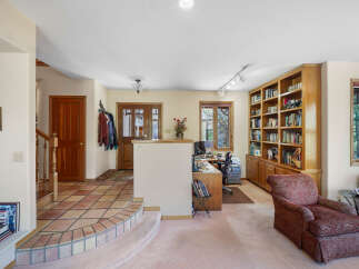 Step into this inviting home featuring a warm and welcoming entryway.