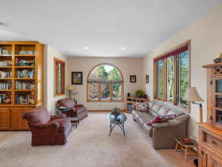 Step into this inviting living room, showcasing a blend of comfort and style.