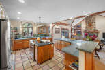 This stunning kitchen boasts a spacious layout, perfect for both cooking and entertaining.