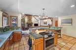 This stunning kitchen boasts a spacious layout with a large island, perfect for culinary creations and entertaining.