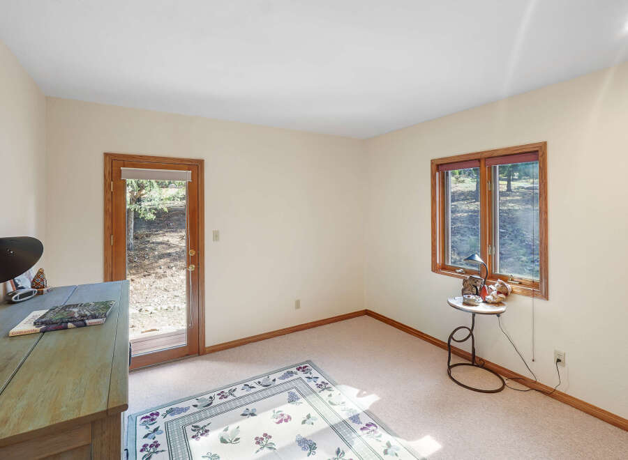 This inviting room features a neutral color palette, creating a bright and airy atmosphere.