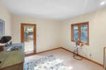 This inviting room features a neutral color palette, creating a bright and airy atmosphere.