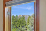Enjoy breathtaking mountain views from this stunning property.