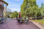 Enjoy outdoor living at its finest with this stunning property featuring a spacious patio and a beautiful dining area.