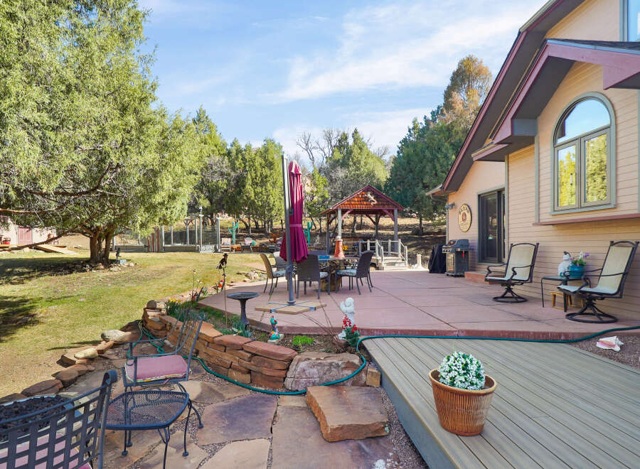 Enjoy outdoor living at its finest in this stunning property! This home features a spacious patio, perfect for entertaining or relaxing.